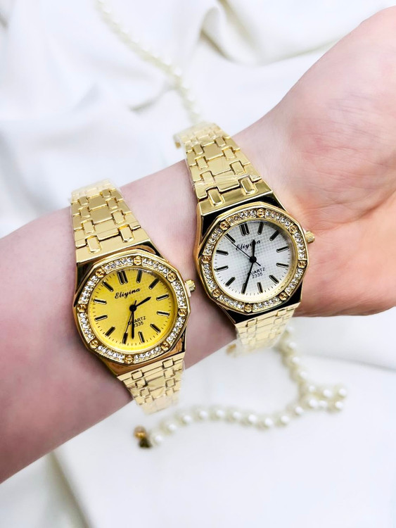 ساعت مچی زنانه طلایی الینا با صفحه زرد و سفید کوارتز