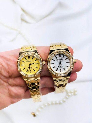 ساعت مچی زنانه طلایی الینا با صفحه زرد و سفید کوارتز