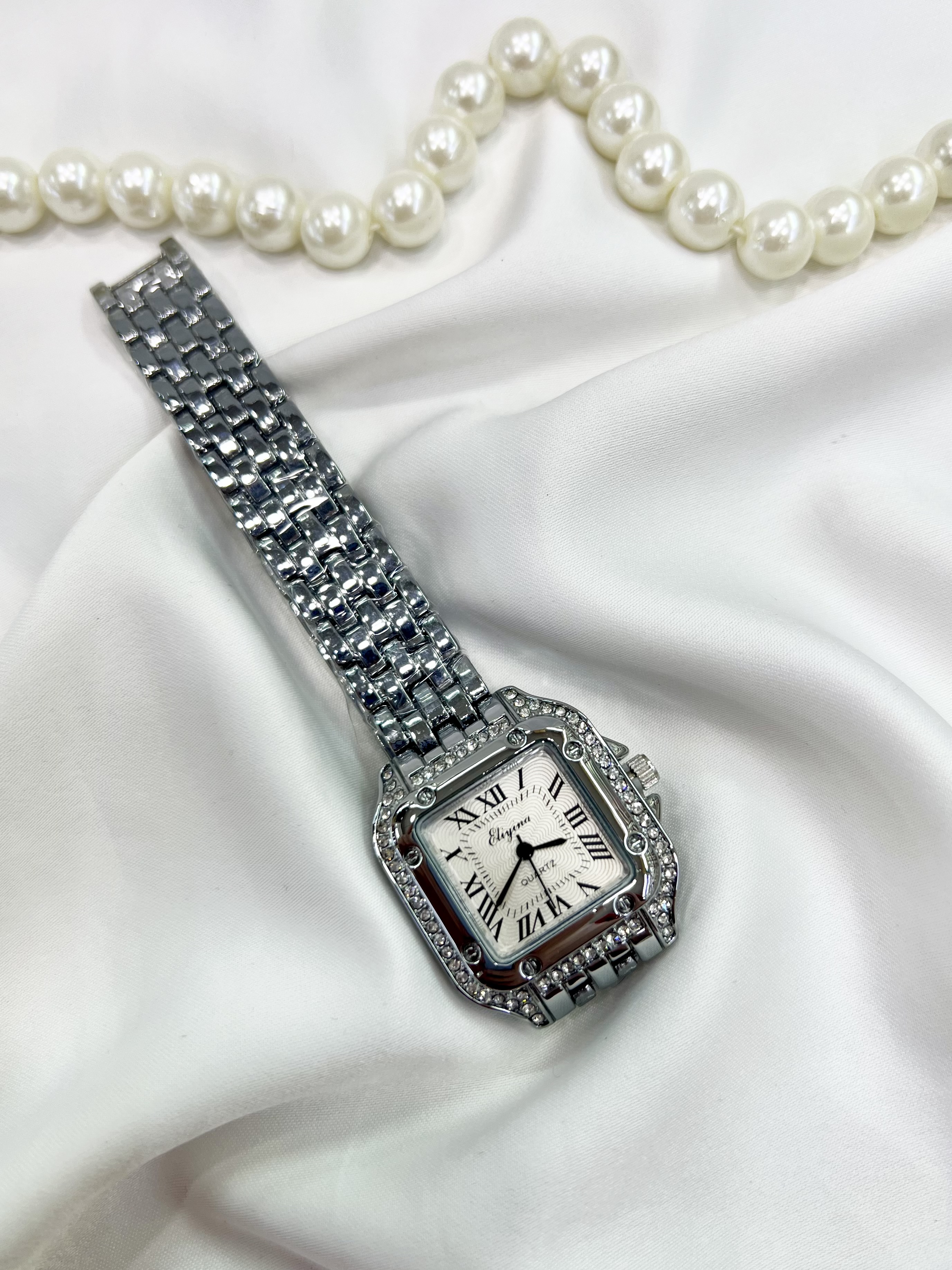 ساعت مچی زنانه الینا رنگ نقره ای نگین دار کوارتز