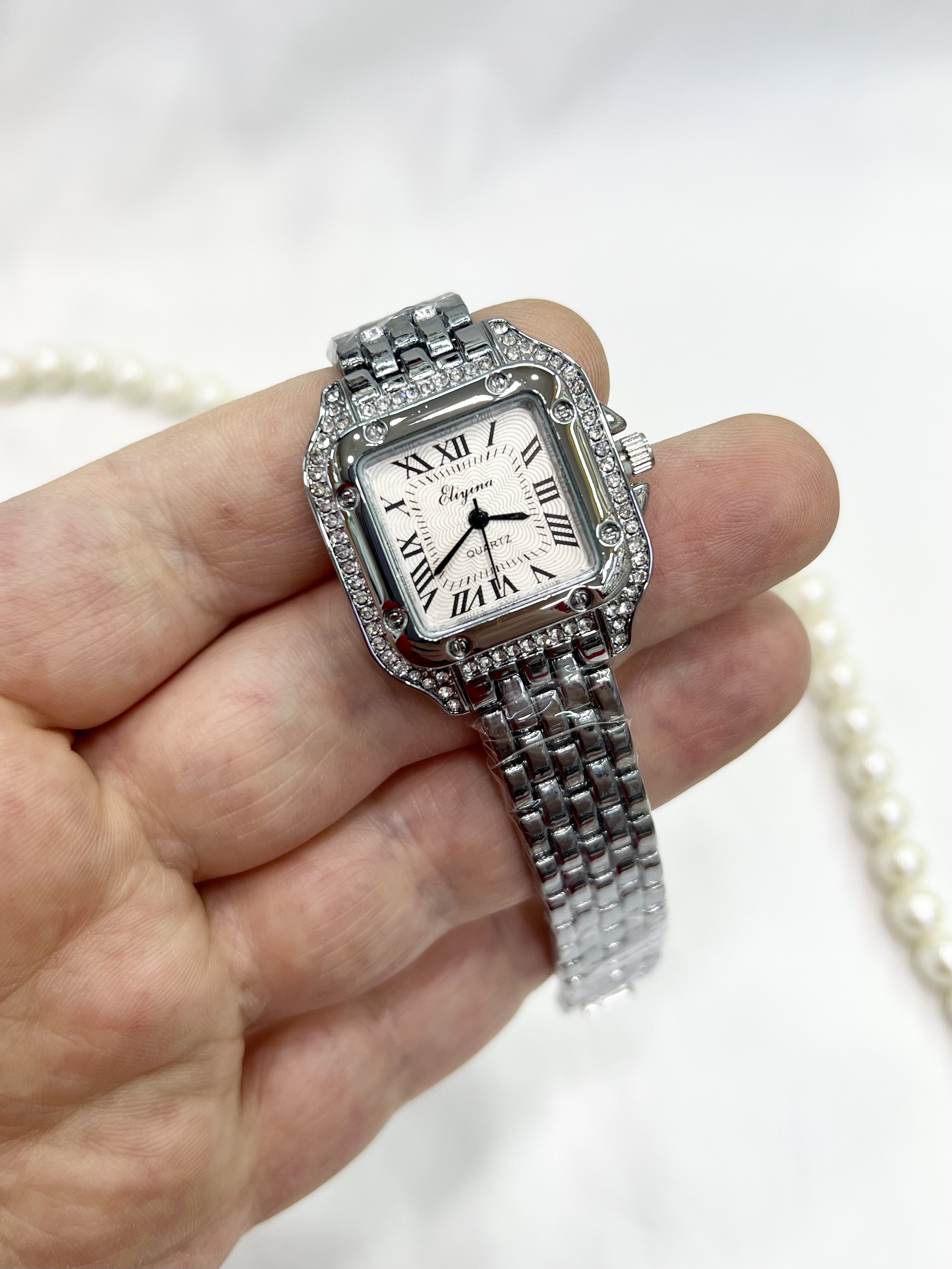 ساعت مچی زنانه الینا رنگ نقره ای نگین دار کوارتز