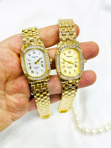 ساعت مچی زنانه الینا طلایی با کریستال دور صفحه و اعداد رومی